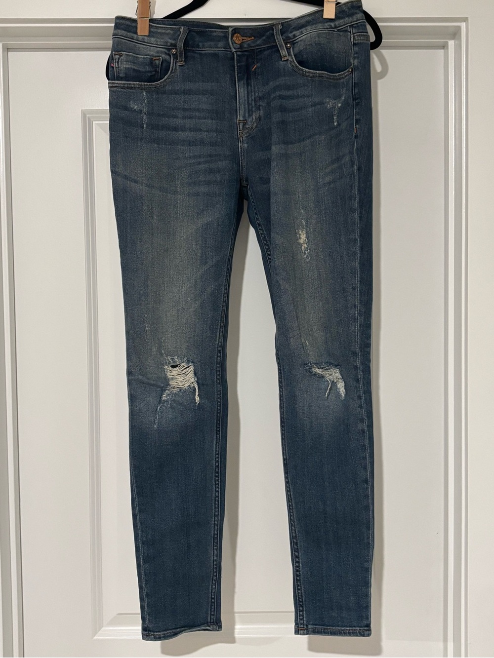Women’s Mid Rise Distressed Jean